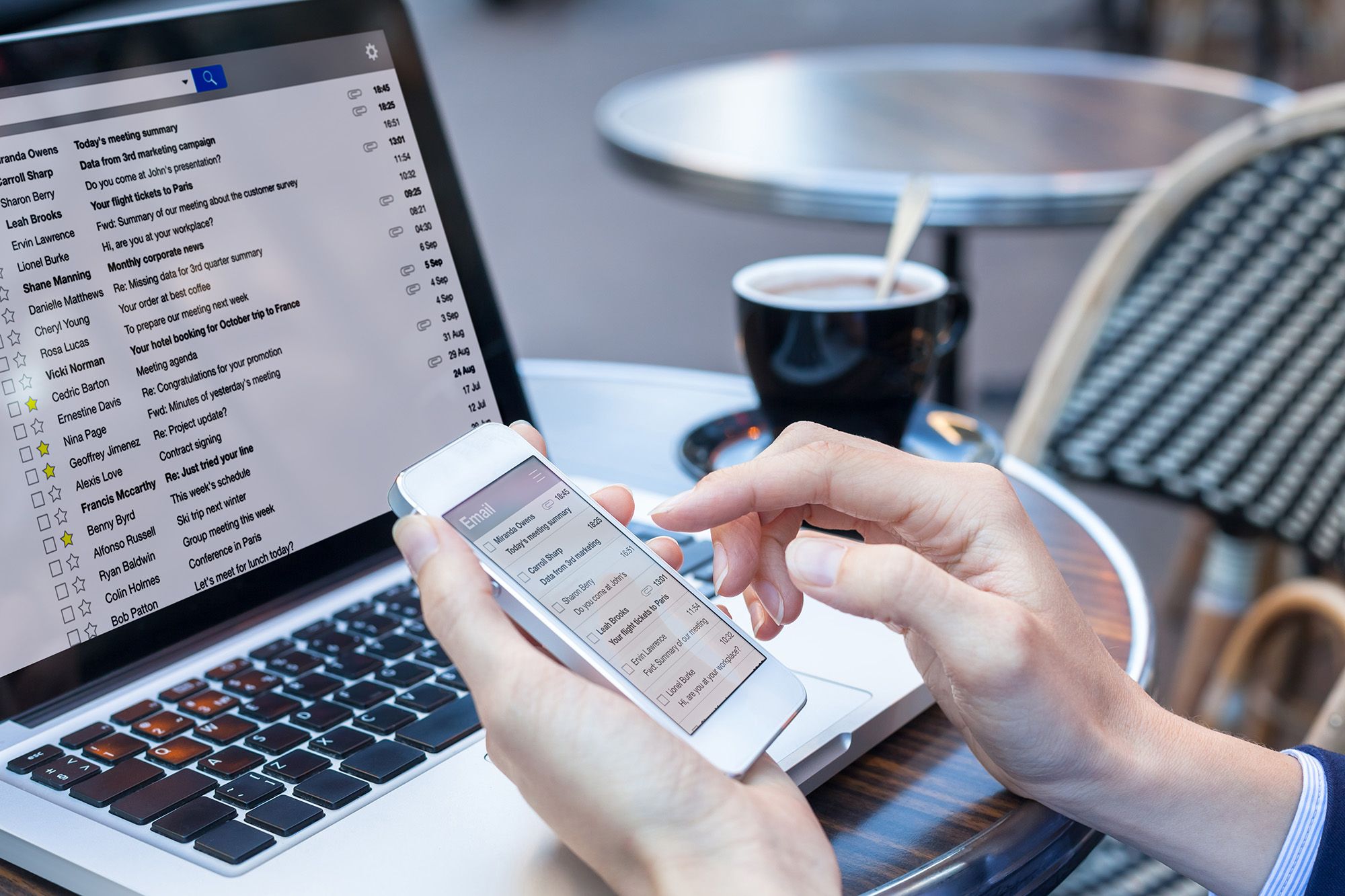 Person checking their emails at a cafe