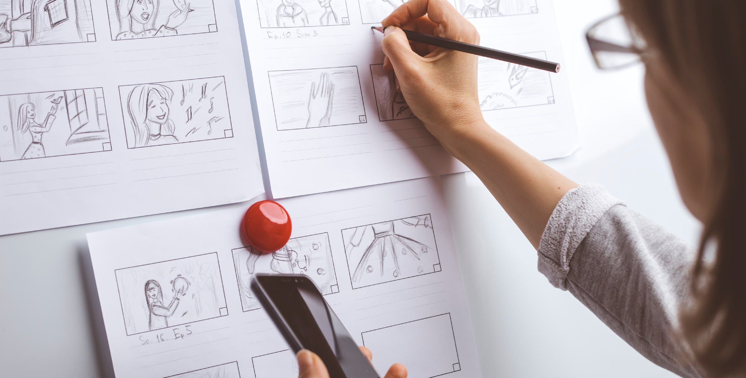 Woman drawing a story board